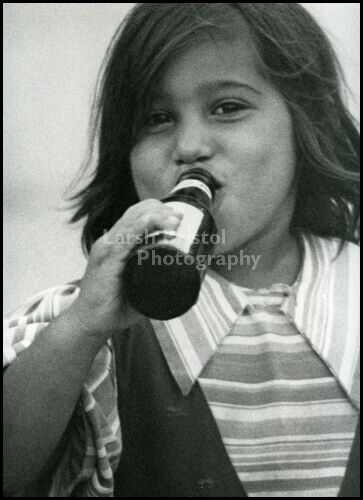 Blackhawk Gypsy Girl Enjoying a Soda Pop