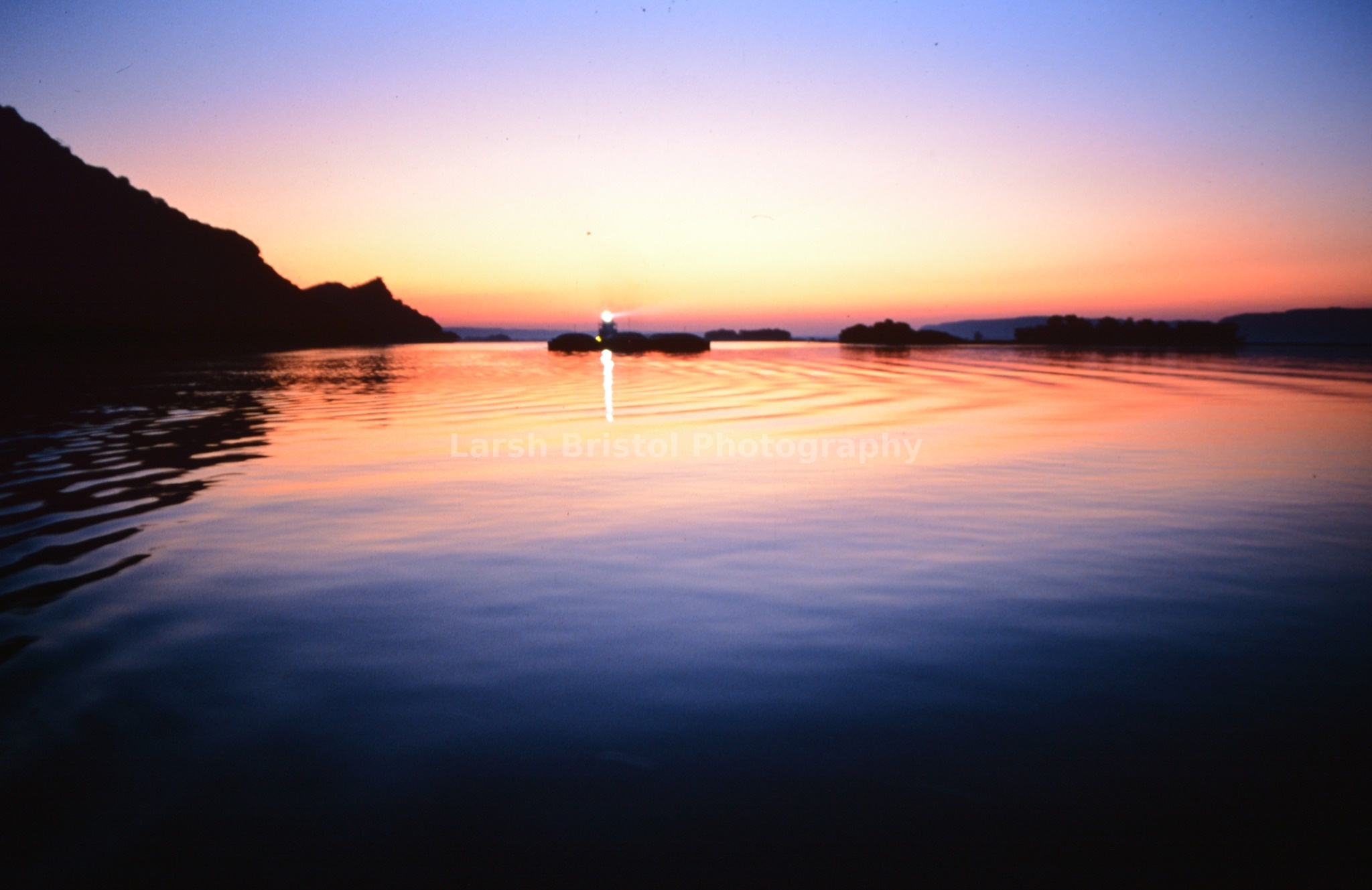 Barge at Night on Mississippi River